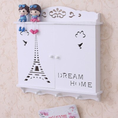 Conteneur de rangement pour câbles escamotable