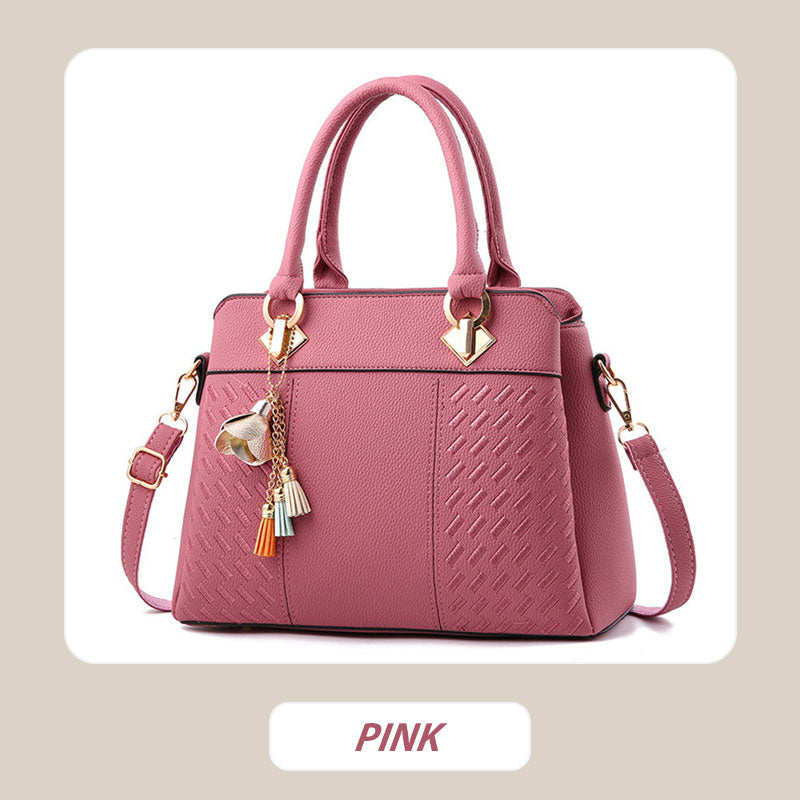 Sac à main élégant pour femme avec détail à pompon