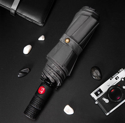 Parapluie compact imperméable avec protection UV et poignée ergonomique 