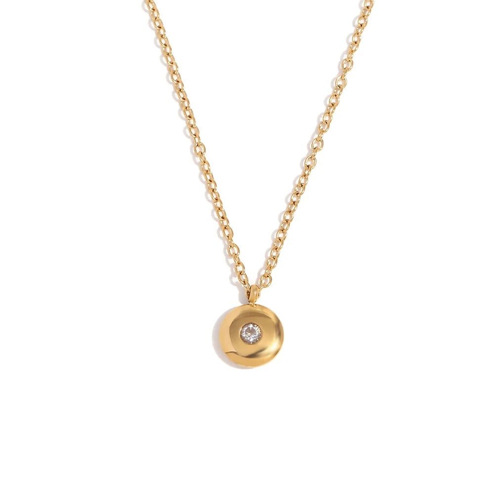 Pendentif délicat en or 18 carats avec pierre de naissance.