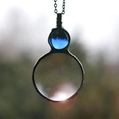 Joli collier pendentif loupe