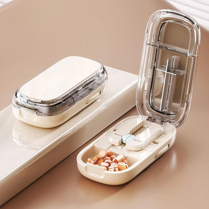 Pilulier compact avec guide de coupe réglable