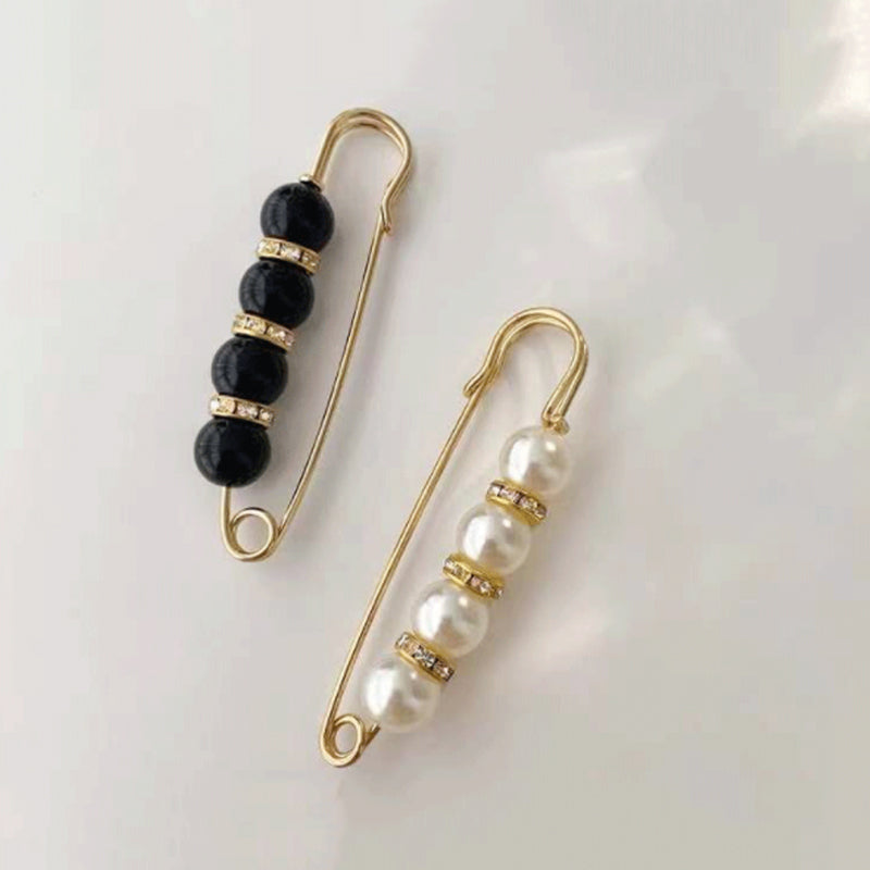 Broche élégante en perle et métal