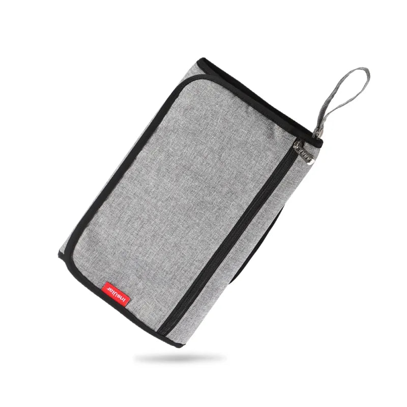 Matelas à langer pliable et compact