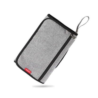 Matelas à langer pliable et compact
