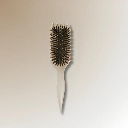 Brosse démêlante à poils doux pour des cheveux lisses
