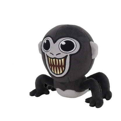 Peluche singe amusante et colorée