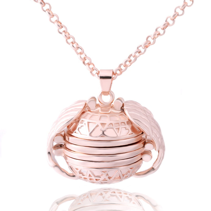 Collier pendentif vintage en forme d'aile