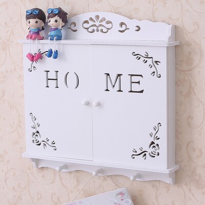 Conteneur de rangement pour câbles escamotable