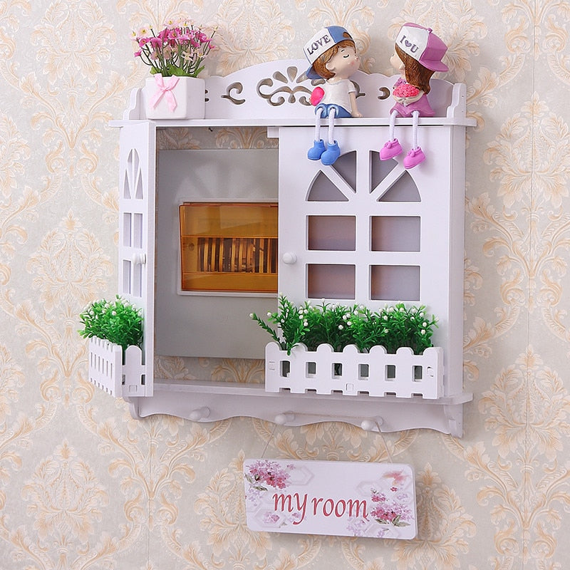 Conteneur de rangement pour câbles escamotable