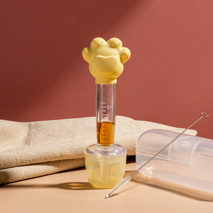 Distributeur d'aliments pour bébé avec gobelet doseur et seringue
