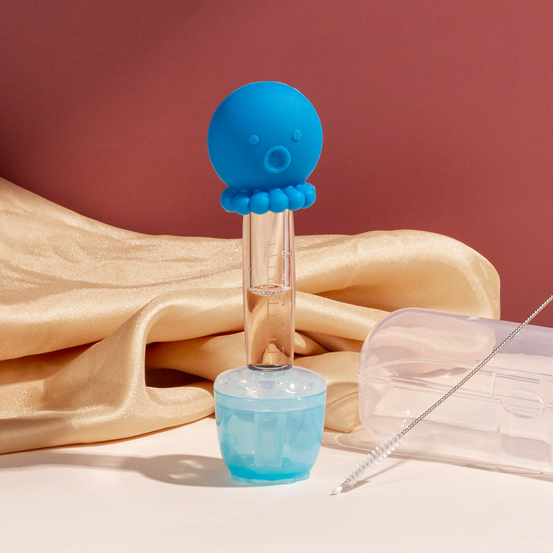 Distributeur d'aliments pour bébé avec gobelet doseur et seringue