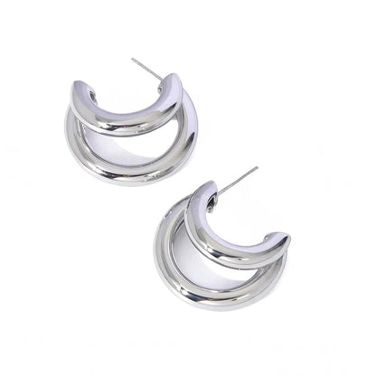 Boucles d'oreilles simples en forme de croissant de lune dorées
