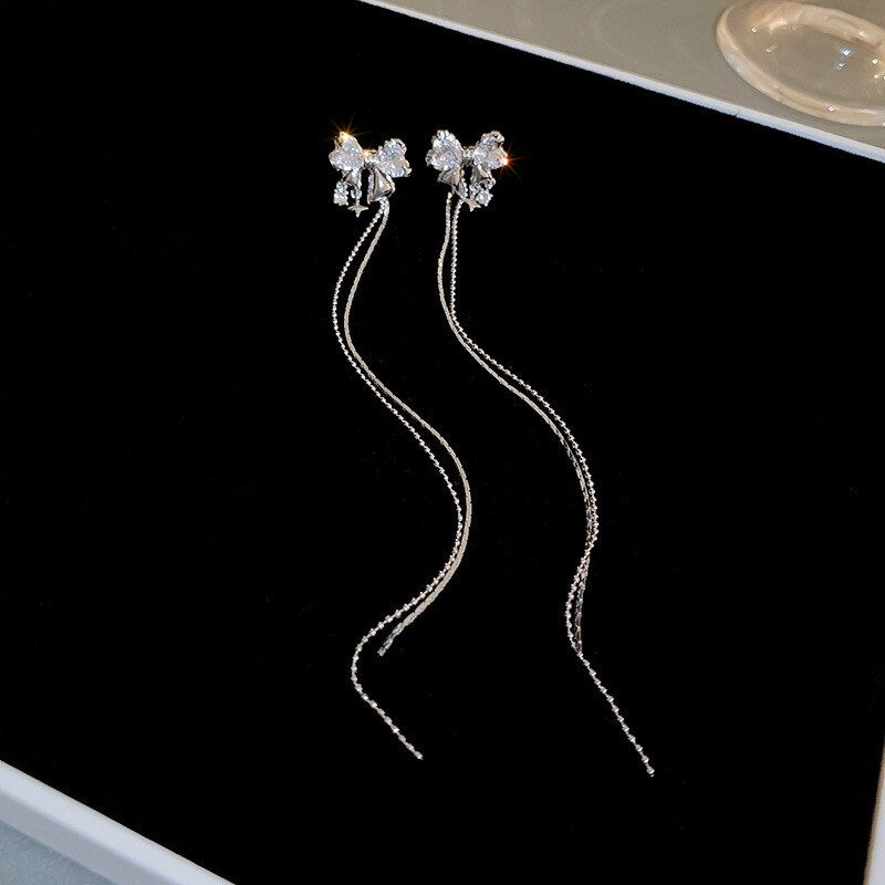 Magnifiques boucles d'oreilles papillon en zircon