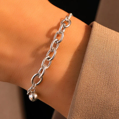 Bracelet à maillons fins et épais en forme de trombone