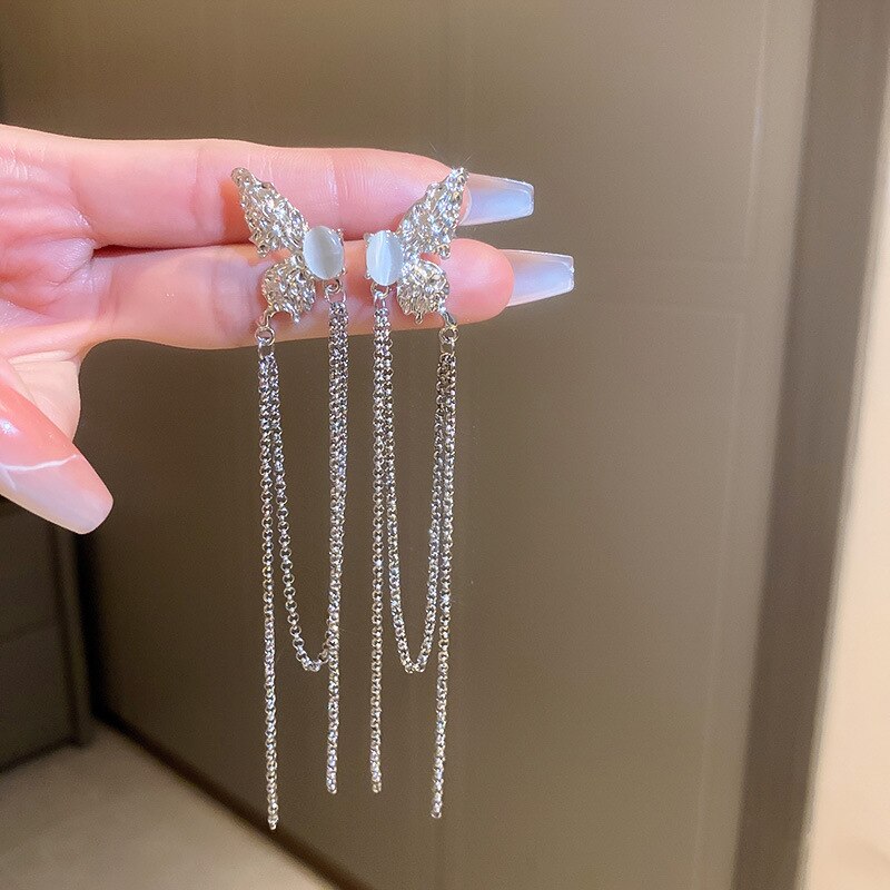 Magnifiques boucles d'oreilles papillon en zircon