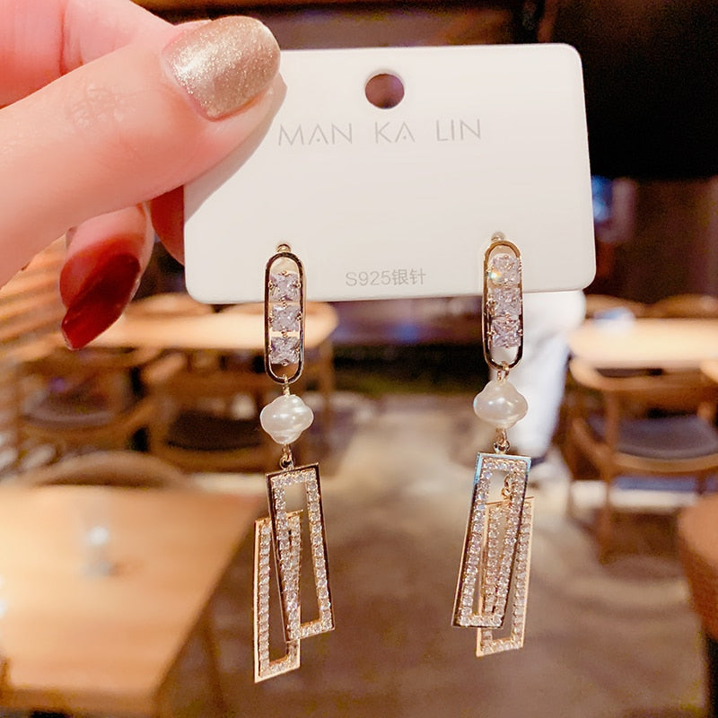 Magnifiques boucles d'oreilles pendantes à motif floral