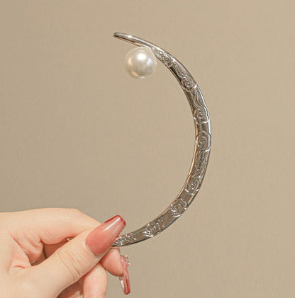 Épingles à cheveux lunaires antiques