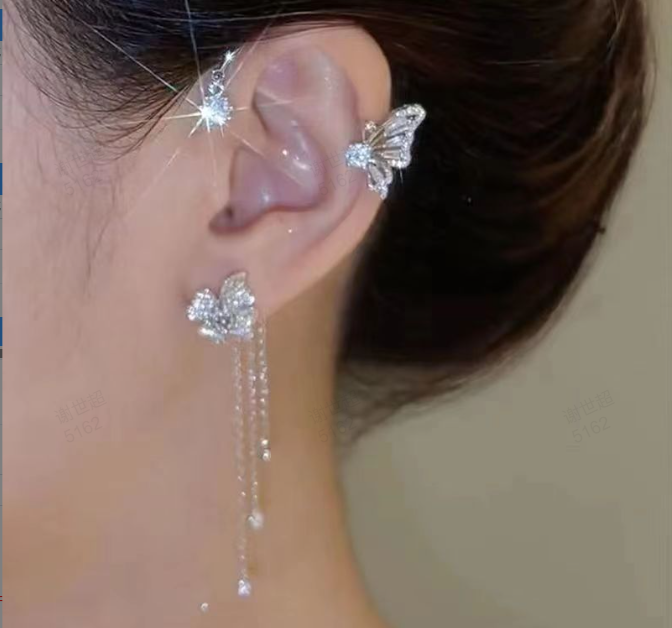 Magnifiques boucles d'oreilles papillon ornées de pierres de zircone étincelantes