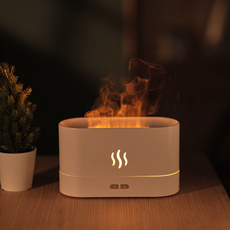 Decorative fireplace with flame effect on a wooden surface, next to a potted plant.