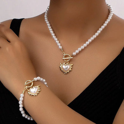 Ensemble bracelet et collier à breloques en forme de cœur perlé 
