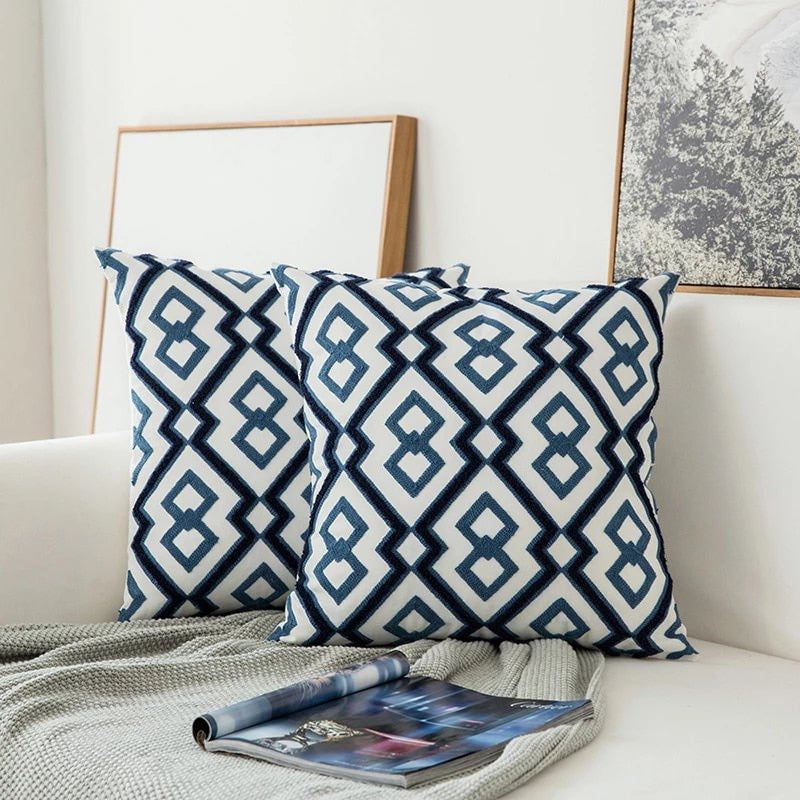Coussin décoratif à motif floral bleu marine