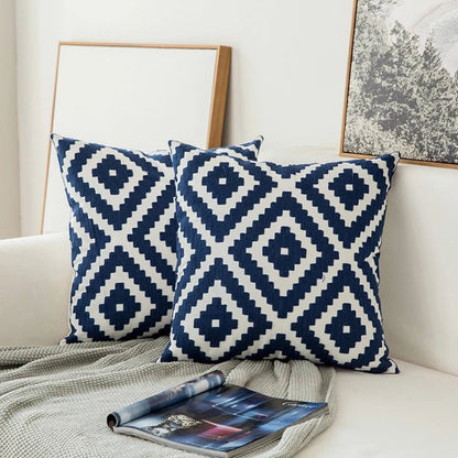 Coussin décoratif à motif floral bleu marine