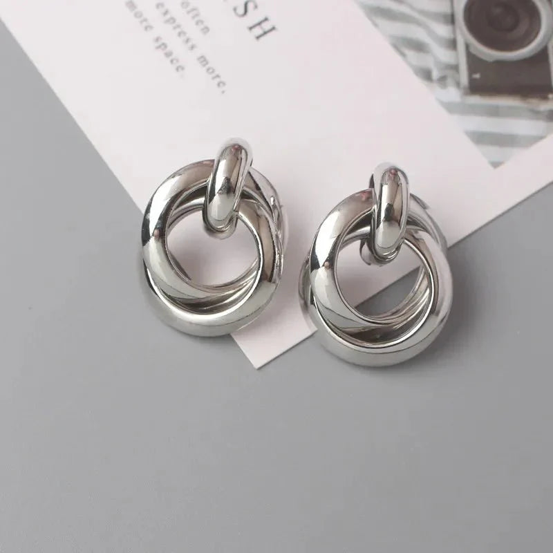 Boucles d'oreilles rondes géométriques tissées