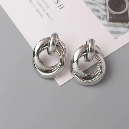 Boucles d'oreilles rondes géométriques tissées