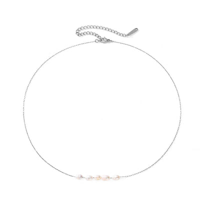 Collier ras du cou délicat à chaîne perlée 