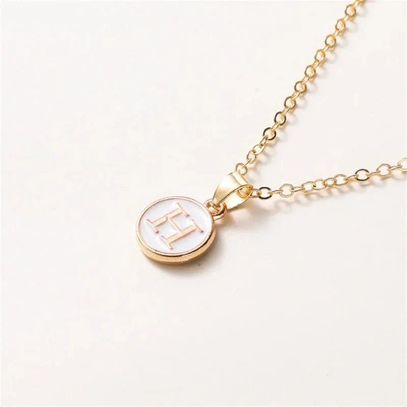 Collier pendentif cercle monogramme or de luxe