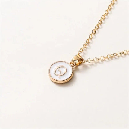 Collier pendentif cercle monogramme or de luxe