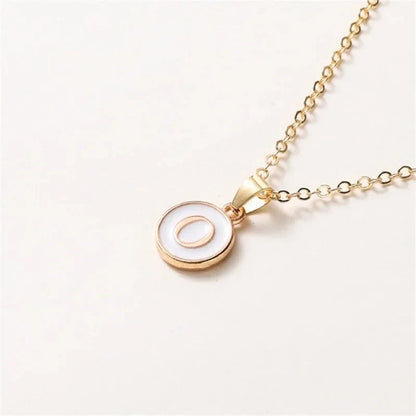 Collier pendentif cercle monogramme or de luxe