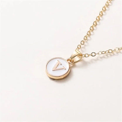 Collier pendentif cercle monogramme or de luxe