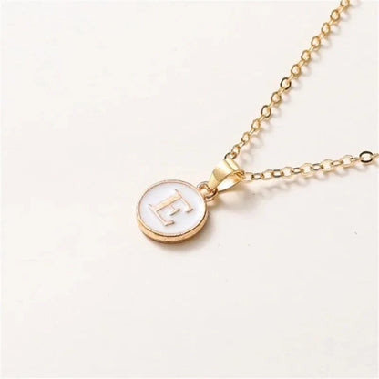 Collier pendentif cercle monogramme or de luxe