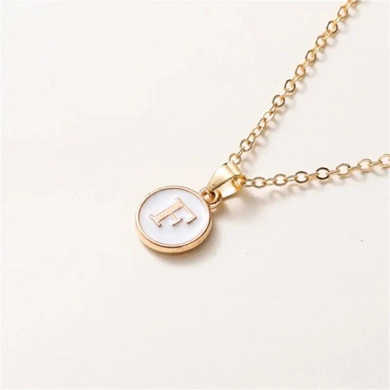 Collier pendentif cercle monogramme or de luxe