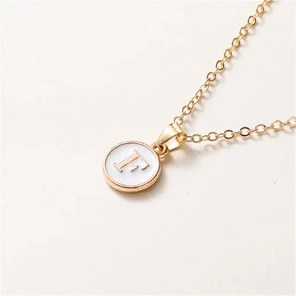 Collier pendentif cercle monogramme or de luxe