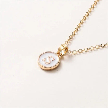 Collier pendentif cercle monogramme or de luxe