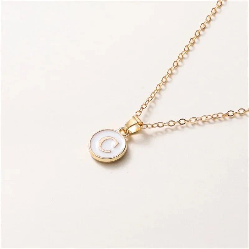 Collier pendentif cercle monogramme or de luxe