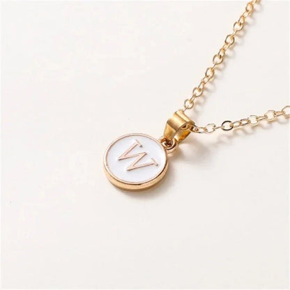 Collier pendentif cercle monogramme or de luxe