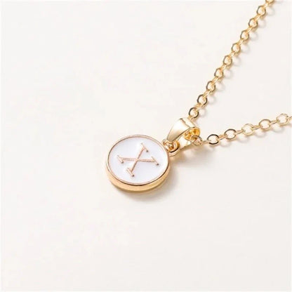 Collier pendentif cercle monogramme or de luxe
