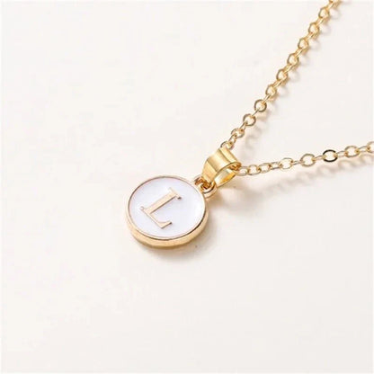Collier pendentif cercle monogramme or de luxe