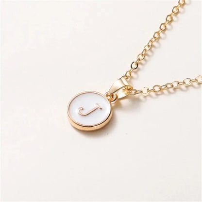 Collier pendentif cercle monogramme or de luxe