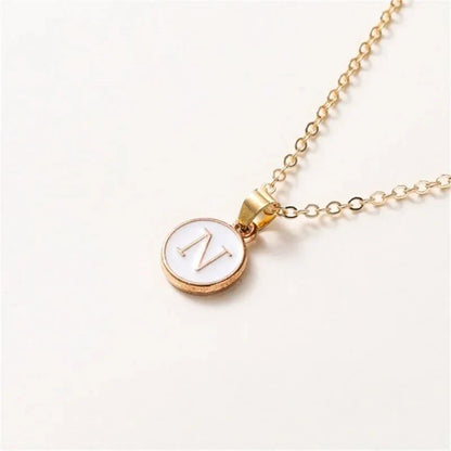 Collier pendentif cercle monogramme or de luxe