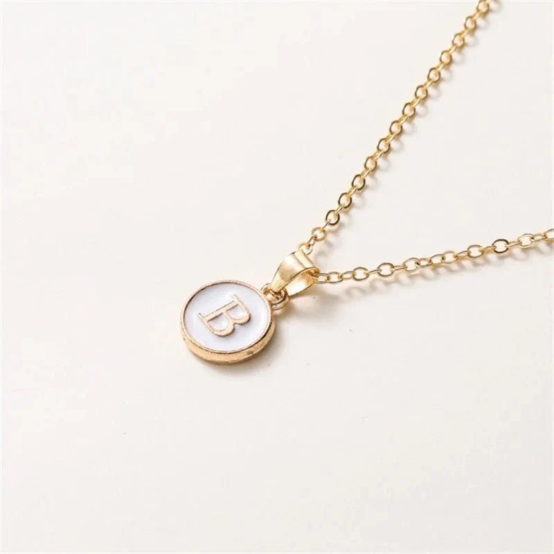 Collier pendentif cercle monogramme or de luxe