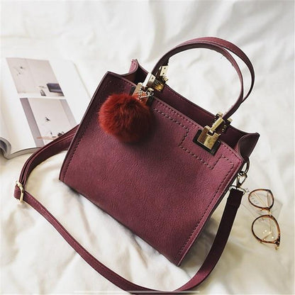 Sac cabas de luxe en cuir souple et fourrure avec pompon pour femme