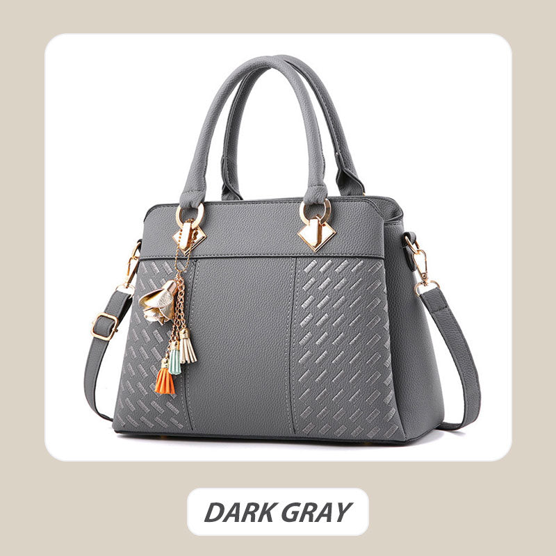 Sac à main élégant pour femme avec détail à pompon