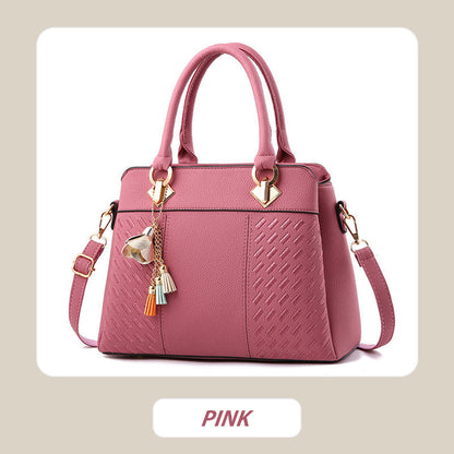 Sac à main élégant pour femme avec détail à pompon