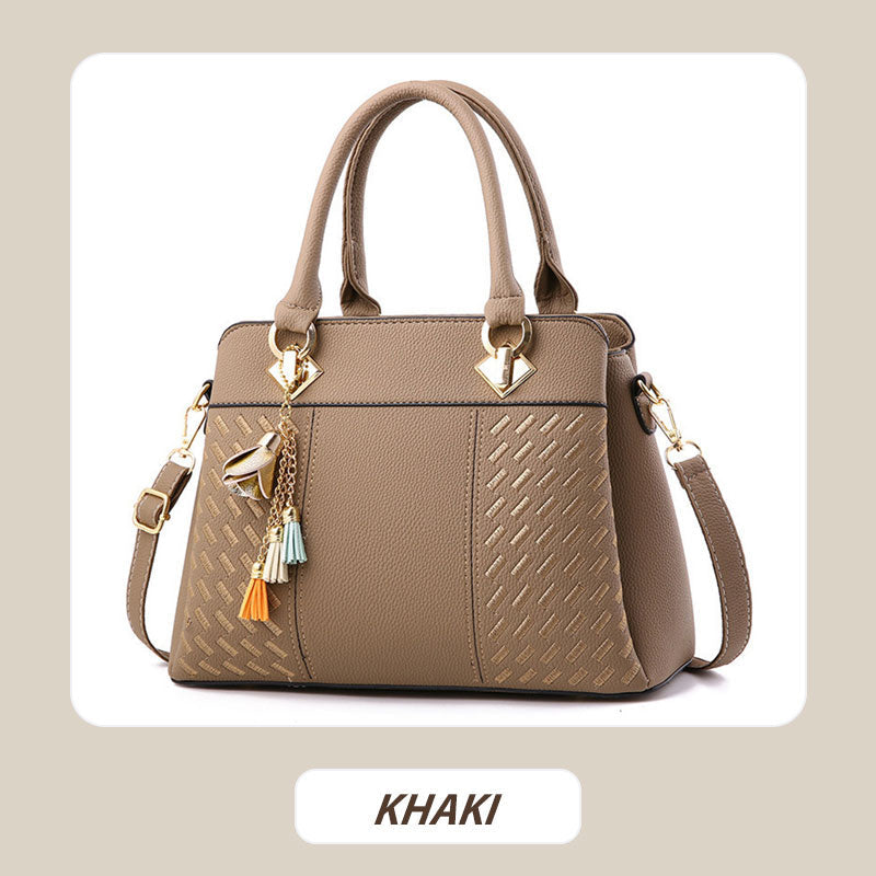 Sac à main élégant pour femme avec détail à pompon
