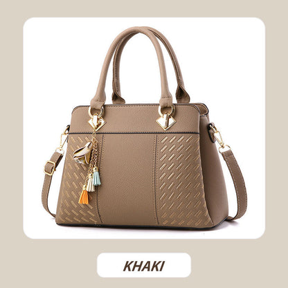 Sac à main élégant pour femme avec détail à pompon